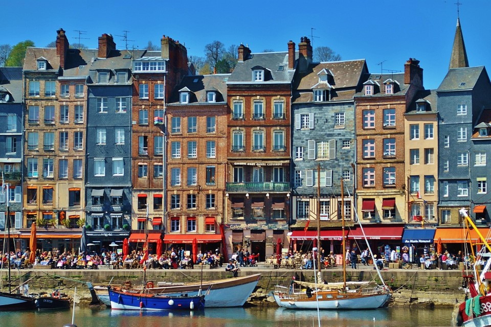 Honfleur, its old harbor, colourful houses and many boats in Normandy, Northern France