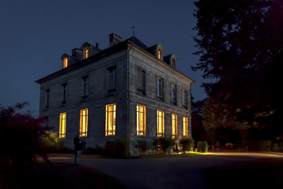 Manor by night.